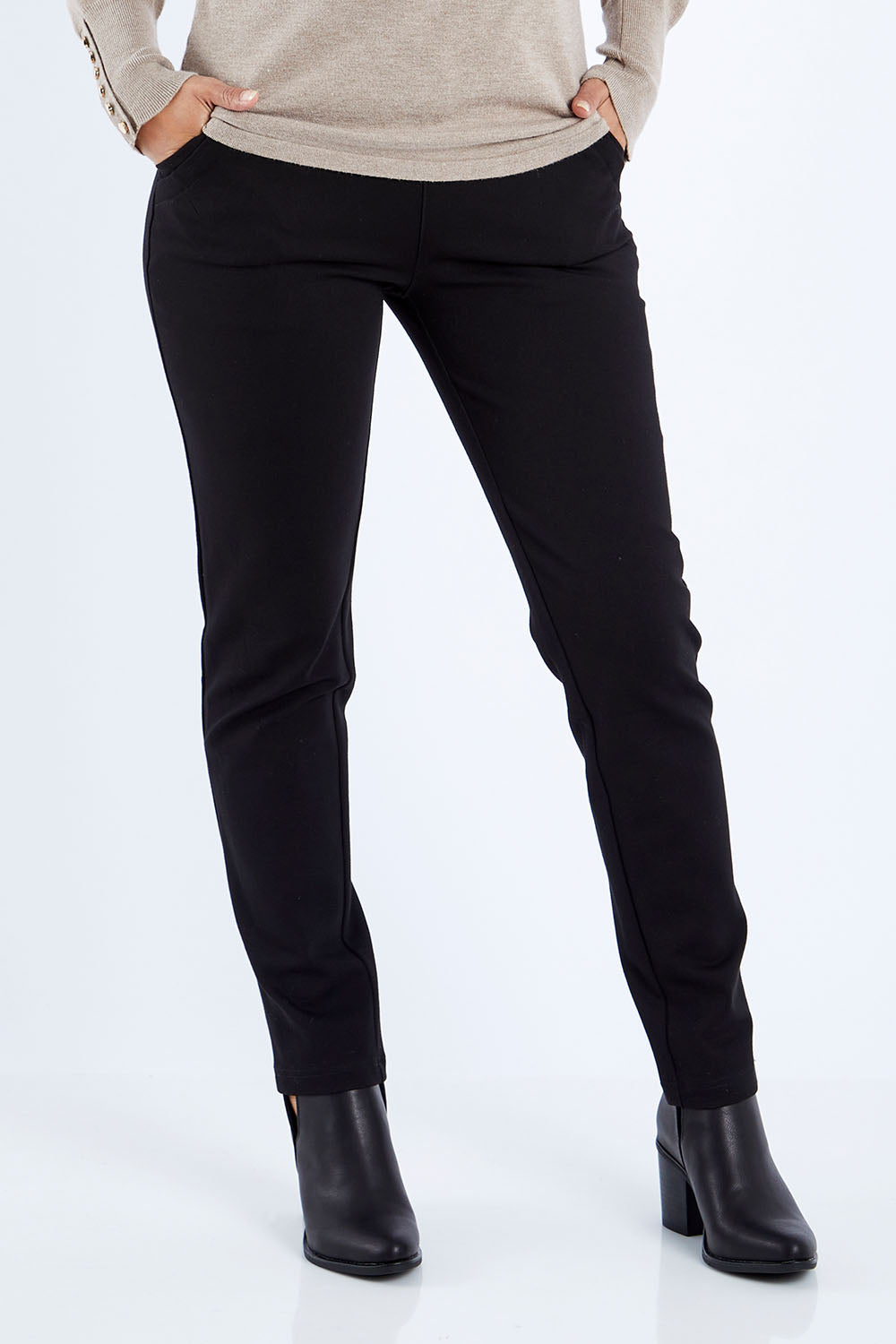 Model Kimberley wearing size 10 of The High Rise Pull On Ponte Pant in colour Black (Black), from the front, cropped image