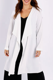 Model Jessica wearing size 14 of The Pleated Back Soft Fall Duster Jacket in colour White (White), from the front, cropped image