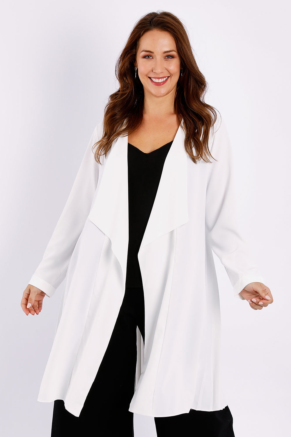 Model Jessica wearing size 14 of The Pleated Back Soft Fall Duster Jacket in colour White (White), from the front, cropped image