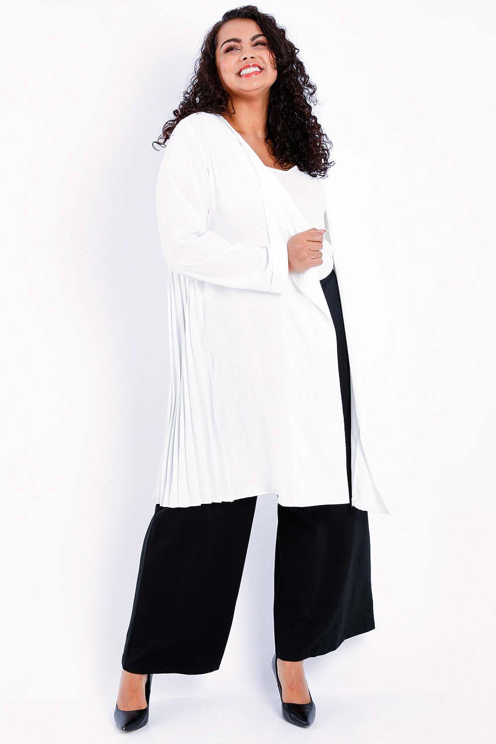 Model Sasha-Lee wearing size 16 of The Pleated Back Soft Fall Duster Jacket in colour White (White), from the front, showing the whole outfit