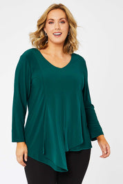 Model Jess wearing size 14 of The Fold Detail Blouse in colour Forest (Green), from the front, cropped image