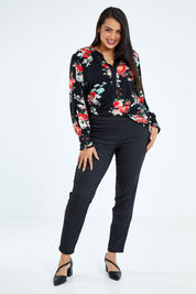 Model Sasha-Lee wearing size 16 of The Stretch Tapered Pull On Pant in colour Black (Black), from the front, showing the whole outfit