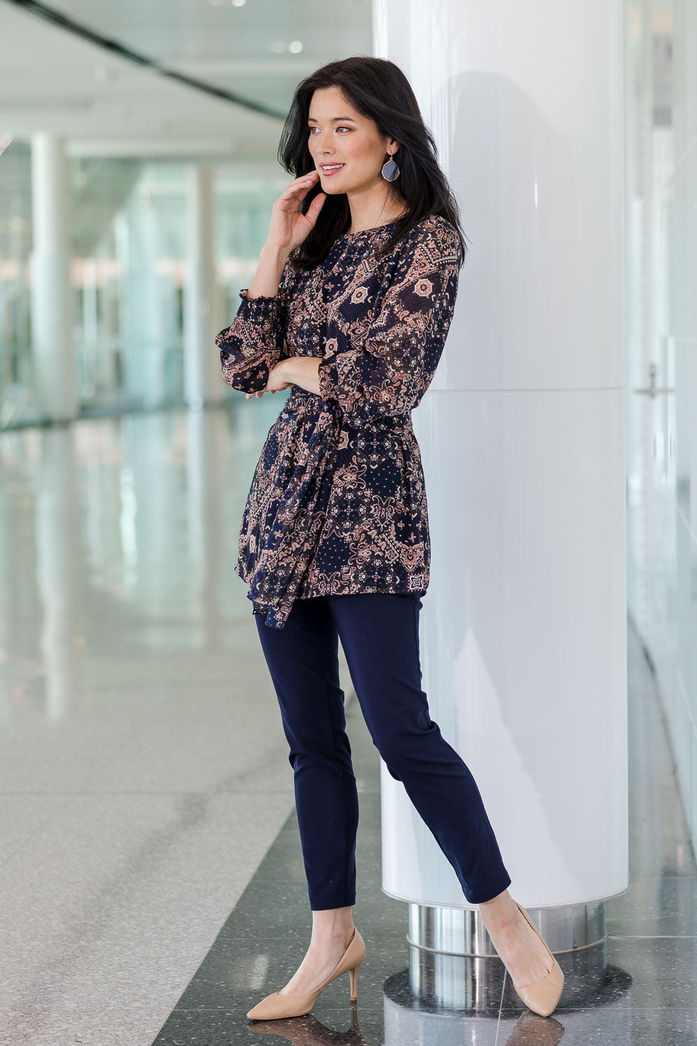 Model Miranda wearing size 10 of The Stretch Career Pull On Pant in colour Navy (Blue), from the front, showing the whole outfit