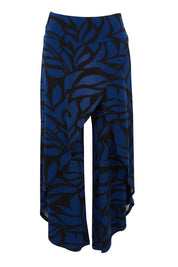 Product shot of The Printed Cross Over Pant in colour Bluevines (Blue), from the front