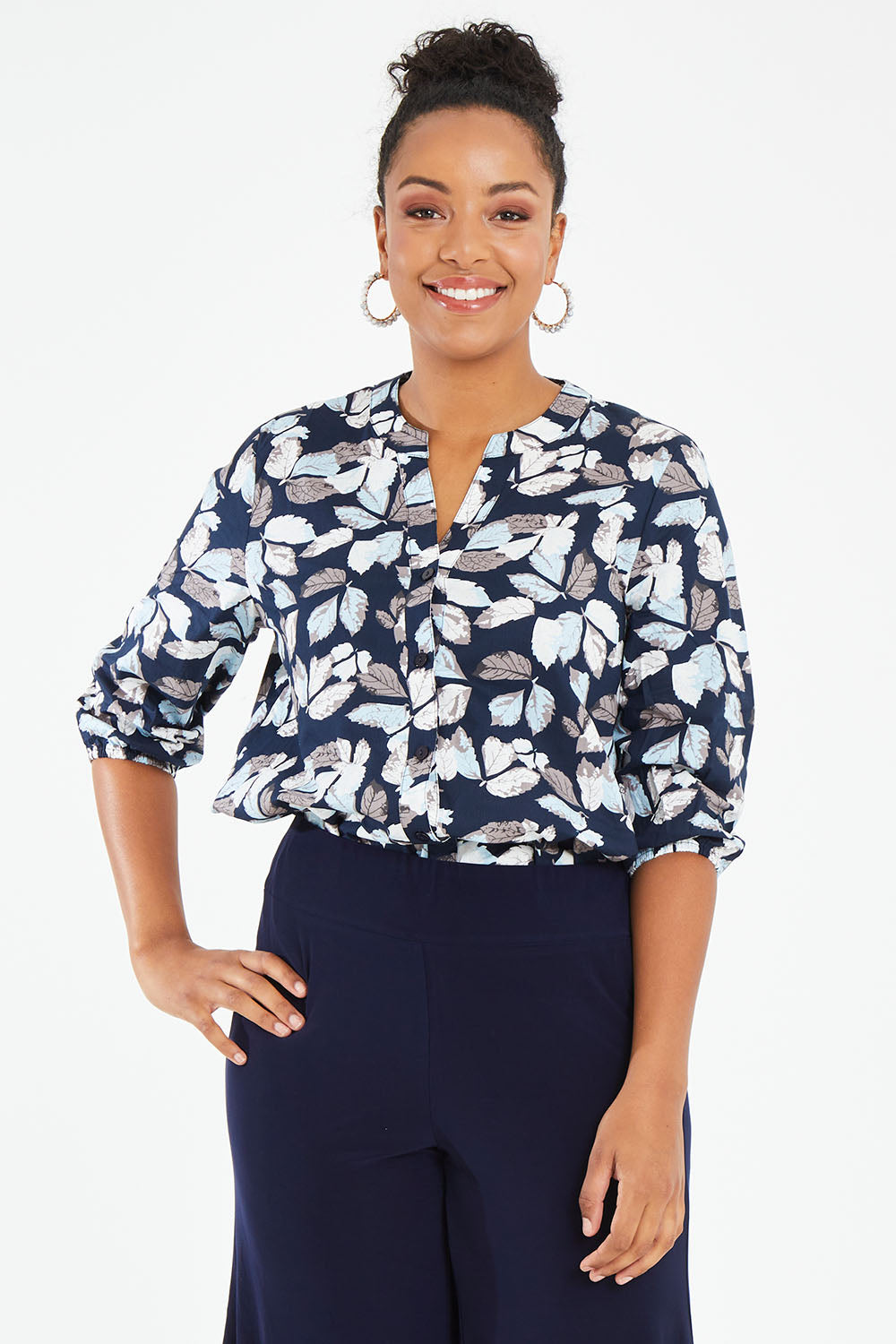 Model Noli wearing size 14 of The 3/4 Sleeve Cotton Shirt in colour Leaf (Blue), from the front, cropped image