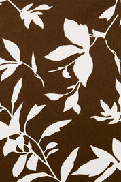Product shot of The Lined Faux Wrap Ruffle Skirt in colour Vines, detail