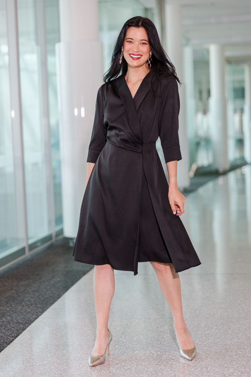 Model Miranda wearing size 10 of The Contemporary Lapel Dress in colour Black (Black), from the front, showing the whole outfit