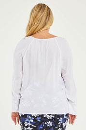Model Katie wearing size 16 of The Pleated Raglan Sleeve Blouse in colour White (White), from the back