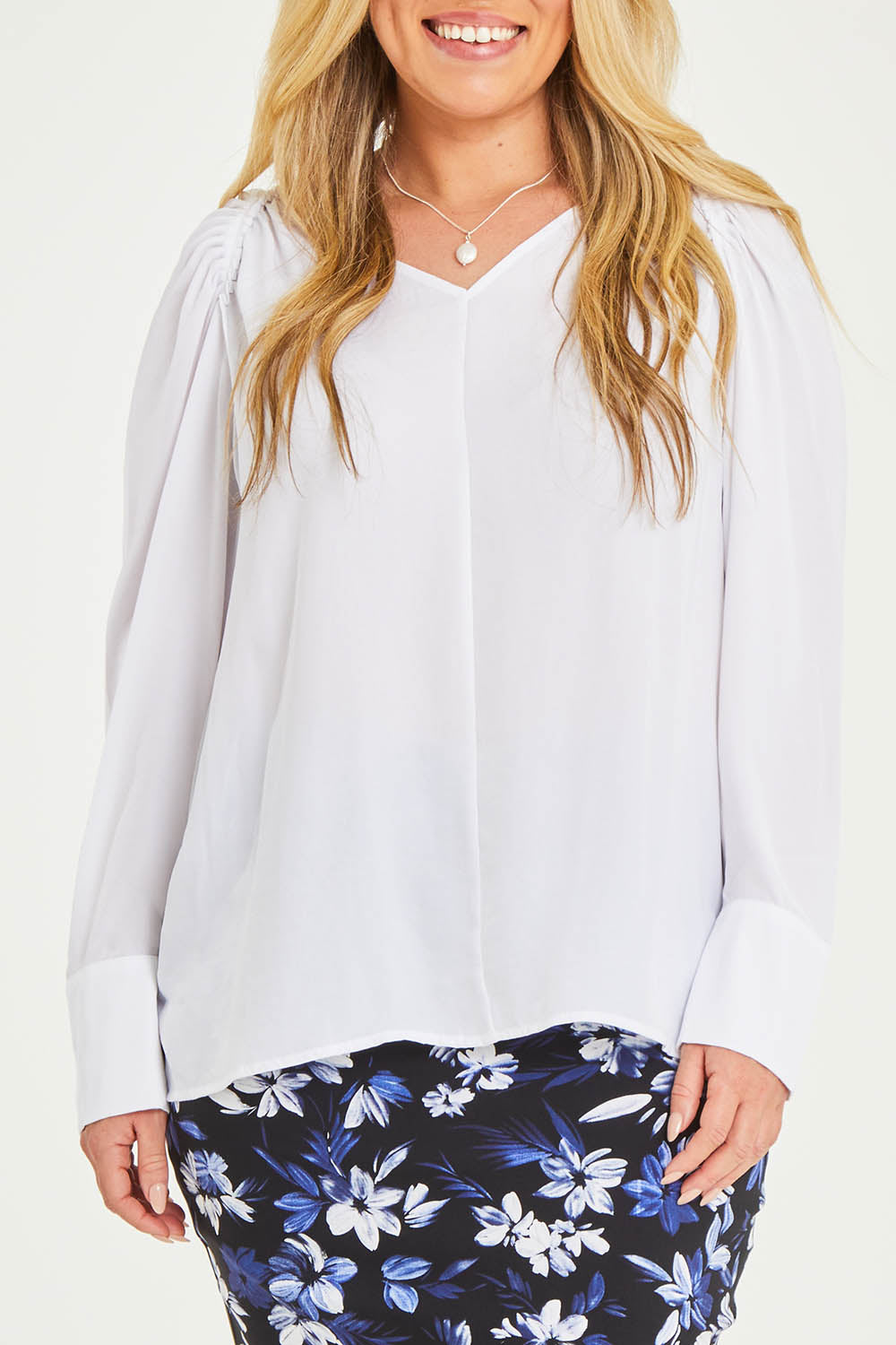 Model Katie wearing size 16 of The Pleated Raglan Sleeve Blouse in colour White (White), from the front, cropped image