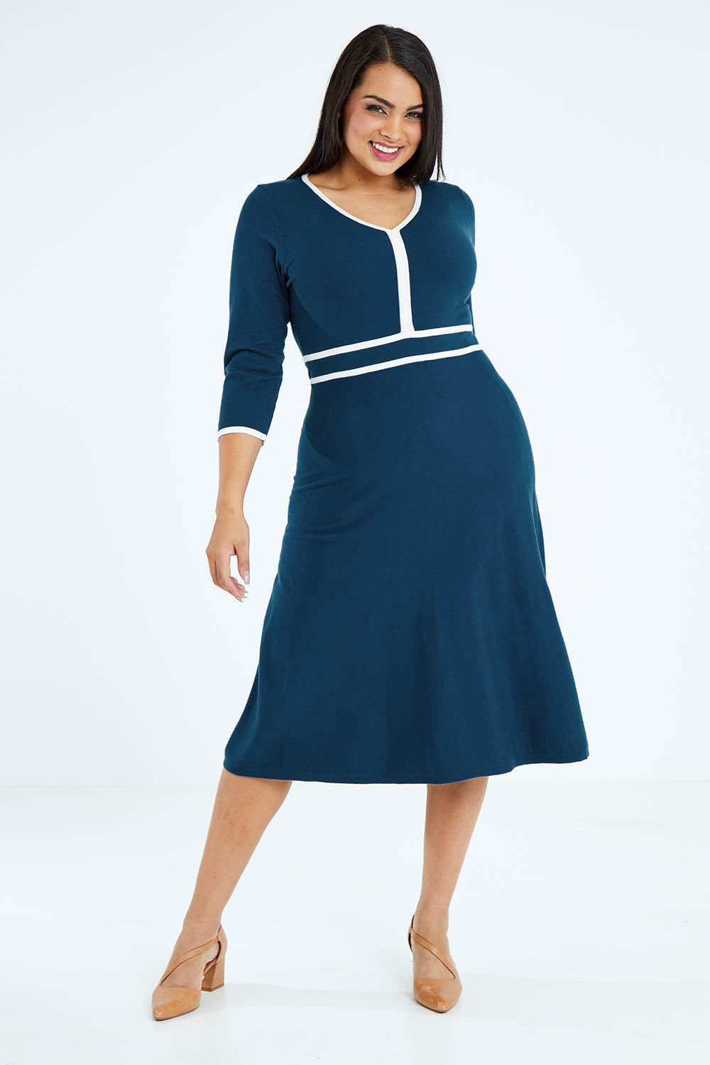 Model Sasha-Lee wearing size XL of The Contrast Trim Knit Dress in colour Petrol (Blue), from the front, showing the whole outfit