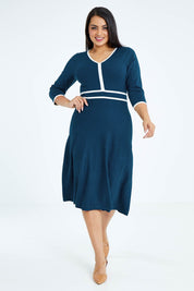 Model Sasha-Lee wearing size XL of The Contrast Trim Knit Dress in colour Petrol (Blue), from the front, showing the whole outfit