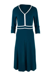 Product shot of The Contrast Trim Knit Dress in colour Petrol (Blue), from the front