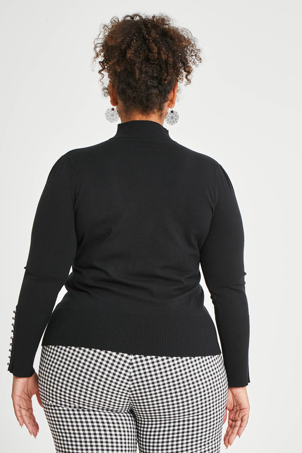 Model Alexis wearing size XL of The Button Detail Knit Jumper in colour Black (Black), from the back