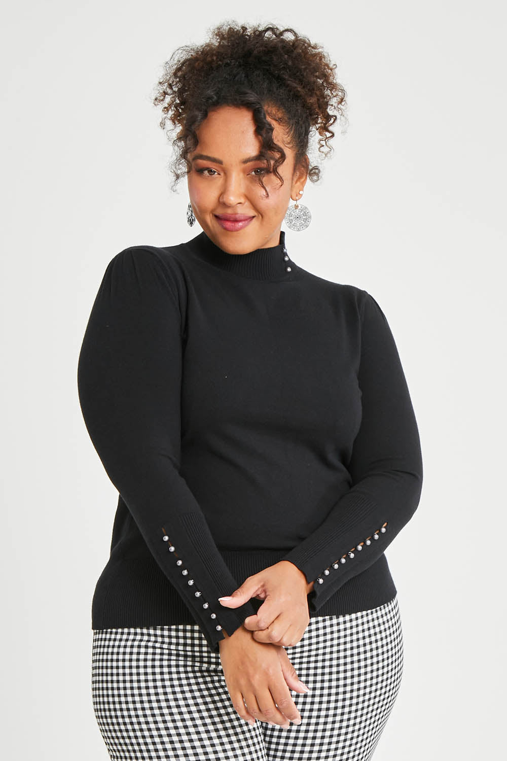 Model Alexis wearing size XL of The Button Detail Knit Jumper in colour Black (Black), from the front, cropped image