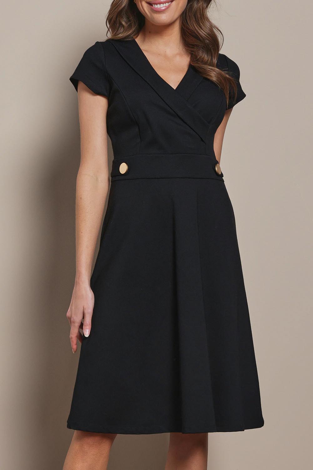 Model Madeline wearing size 10 of The Cap Sleeve Ponte Lapel Dress in colour Black (Black), from the front, cropped image