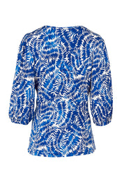 Product shot of The Printed Knot Waist Detail Blouse in colour Fern (Blue), from the back