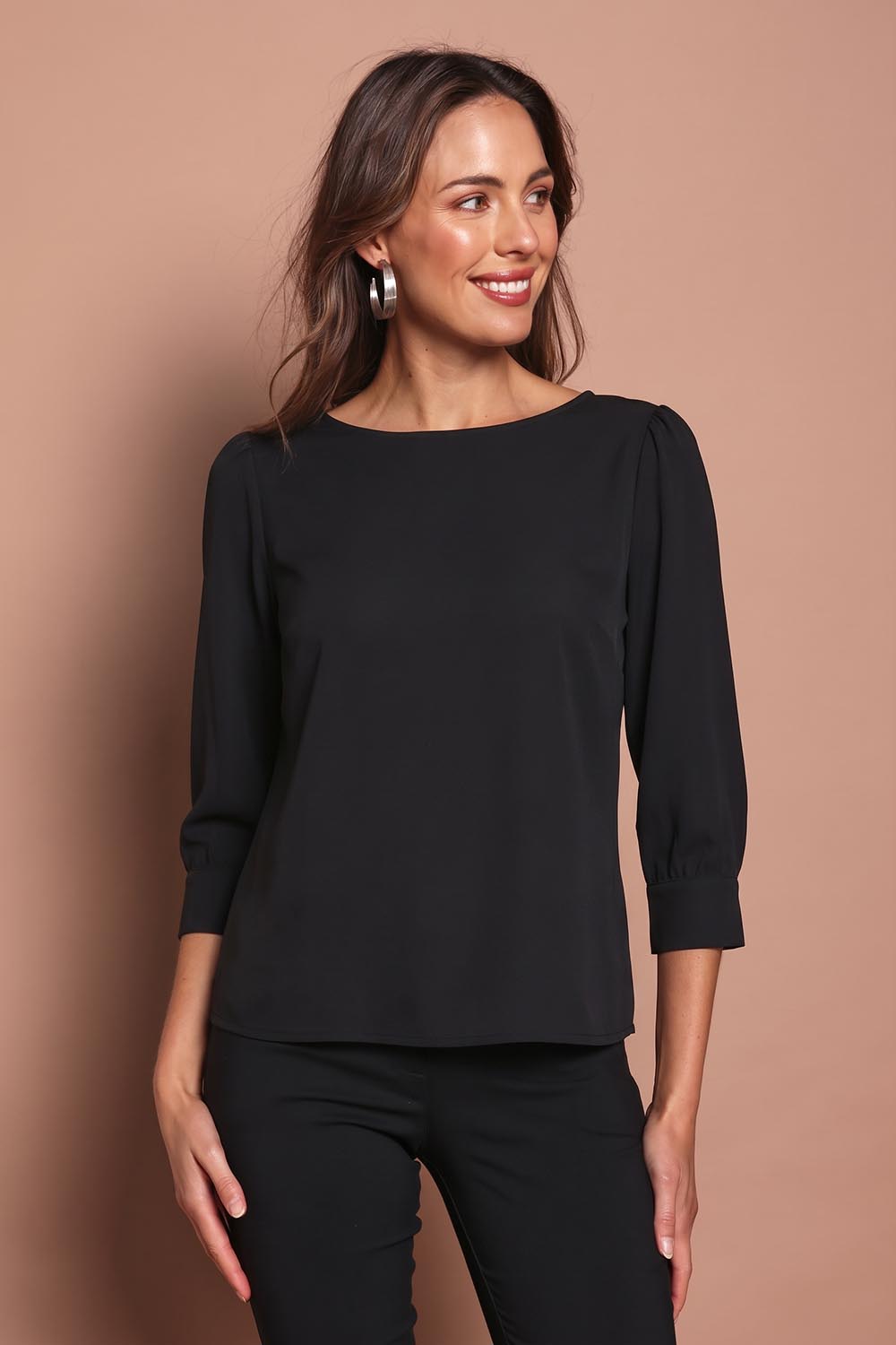 Model Madelinec wearing size 10 of the The Bamboo Boat Neck Top - Jetblack in colour Jetblack, in a cropped view