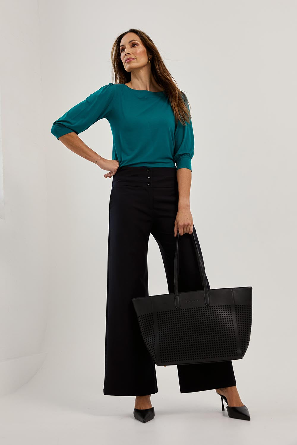 Model Amanda wearing size 10 of The Bamboo Boat Neck Top in colour Tealgreen (Green), from the front, showing the whole outfit