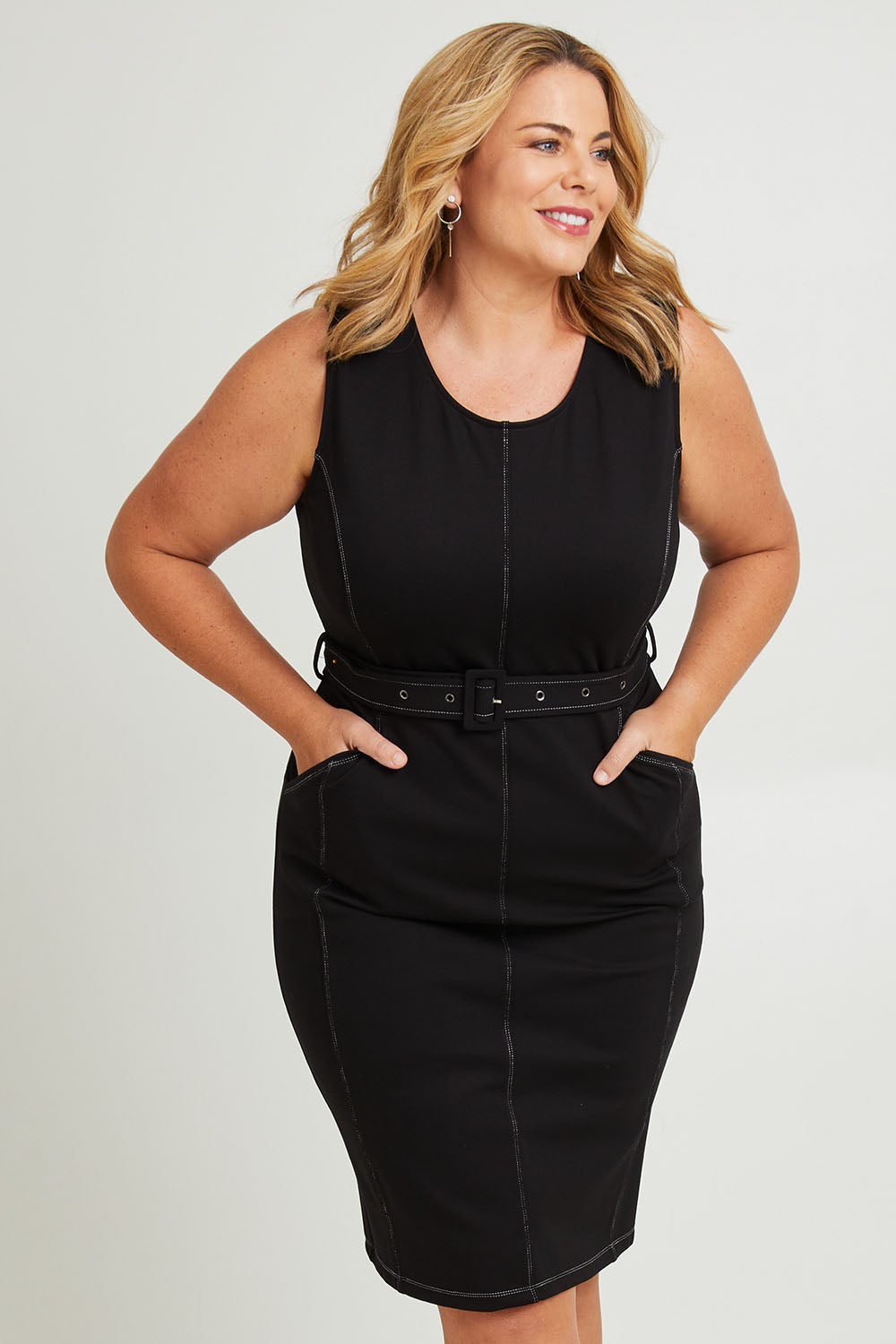 Model Fiona wearing size 16 of The Contrast Stitching Ponte Dress in colour Black (Black), from the front, cropped image