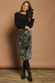 Model Madeline wearing size 10 of The Printed Velvet Pull On Skirt in colour Leopard (Black), from the front, showing the whole outfit