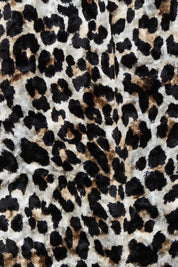 Product shot of The Printed Velvet Pull On Skirt in colour Leopard (Black), detail