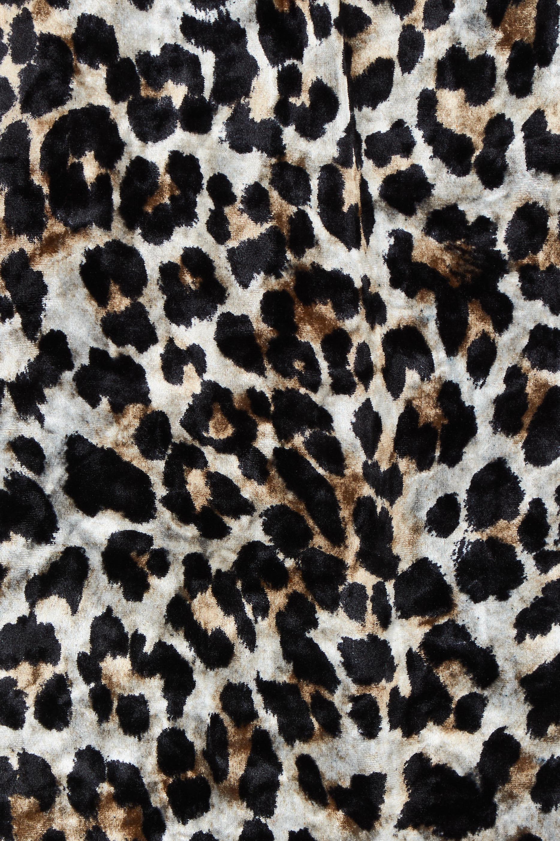 Product shot of The Printed Velvet Pull On Skirt in colour Leopard (Black), detail