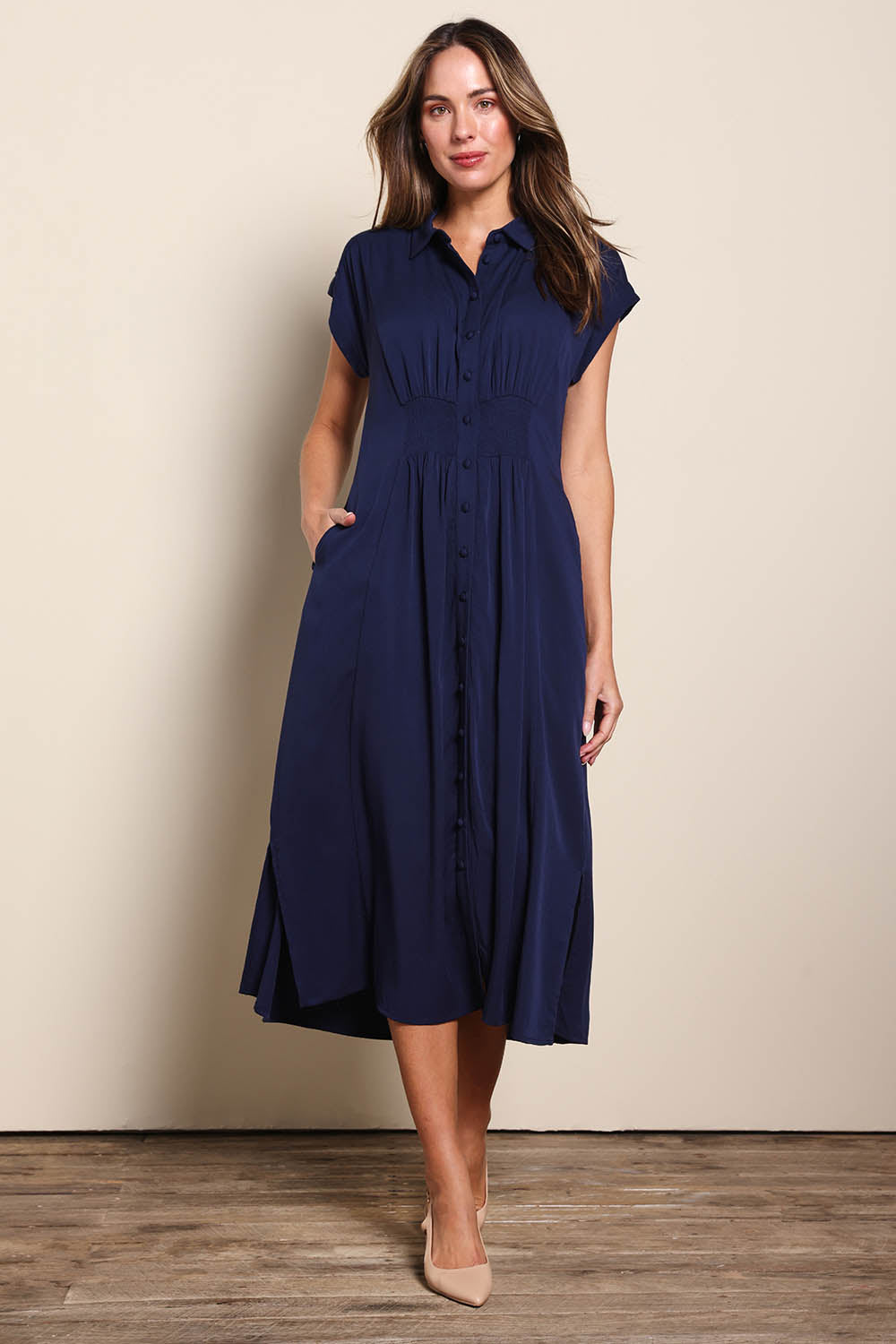 Model Madelinec wearing size 10 of the The Shirred Waist Detail Dress - Navyblue in colour Navyblue, from the front