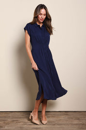 Model Madelinec wearing size 10 of the The Shirred Waist Detail Dress - Navyblue in colour Navyblue, from the front
