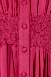 Product shot of The Shirred Waist Detail Dress in colour Raspberry (Red), detail