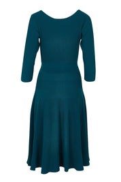 Product shot of The 3/4 Sleeve Reversible Knit Dress in colour Darkpetrol (Blue), from the back