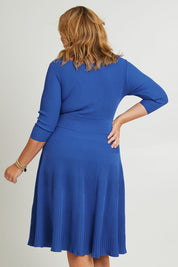 Model Fiona wearing size XL of The 3/4 Sleeve Reversible Knit Dress in colour Royalazure (Blue), from the back