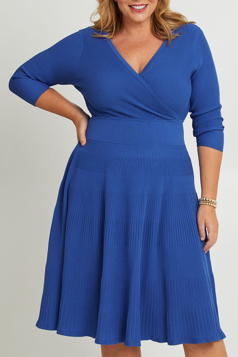 Model Fiona wearing size XL of The 3/4 Sleeve Reversible Knit Dress in colour Royalazure (Blue), from the front, cropped image