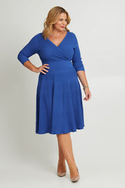 Model Fiona wearing size XL of The 3/4 Sleeve Reversible Knit Dress in colour Royalazure (Blue), from the front, showing the whole outfit