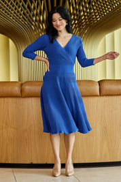 Model Miranda wearing size S of The 3/4 Sleeve Reversible Knit Dress in colour Royalazure (Blue), from the front, showing the whole outfit