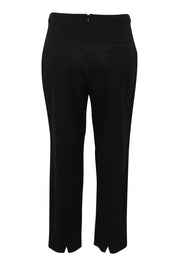 Product shot of The Button Tailored Stretch Pant in colour Black (Black), from the back