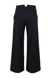 Product shot of The Tailored Pant in colour Ink (Blue), from the back