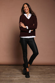 Model Amanda wearing size 10 of The Define 7/8 Pull On Pant in colour Meteorite (Black), from the front, showing the whole outfit