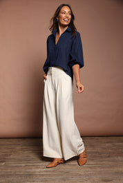 Model Amanda wearing size 10 of The Cotton Blouson Sleeve Shirt in colour Navy (Blue), from the front, showing the whole outfit