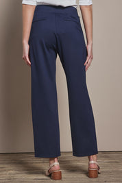 Model Madeline wearing size 10 of The Straight Cut Pull On Ponte Pant in colour Darknavy (Blue), from the back