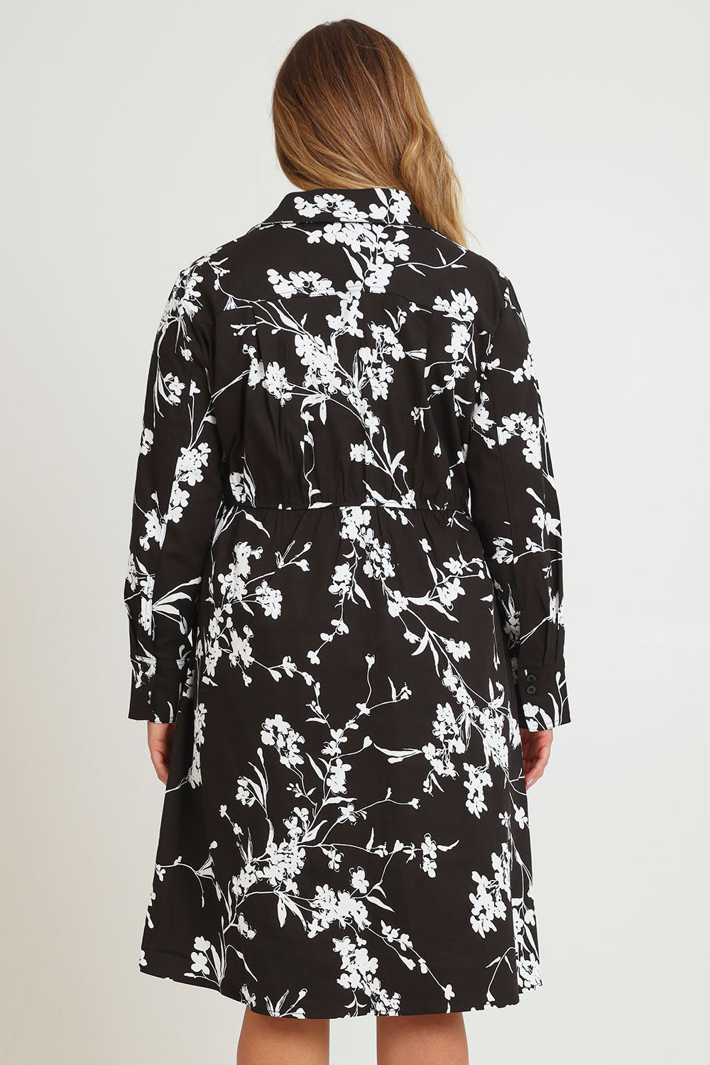 Model Chanel wearing size 16 of The Printed Cotton Stretch Shirt Dress in colour Blackfleur (Black), from the back