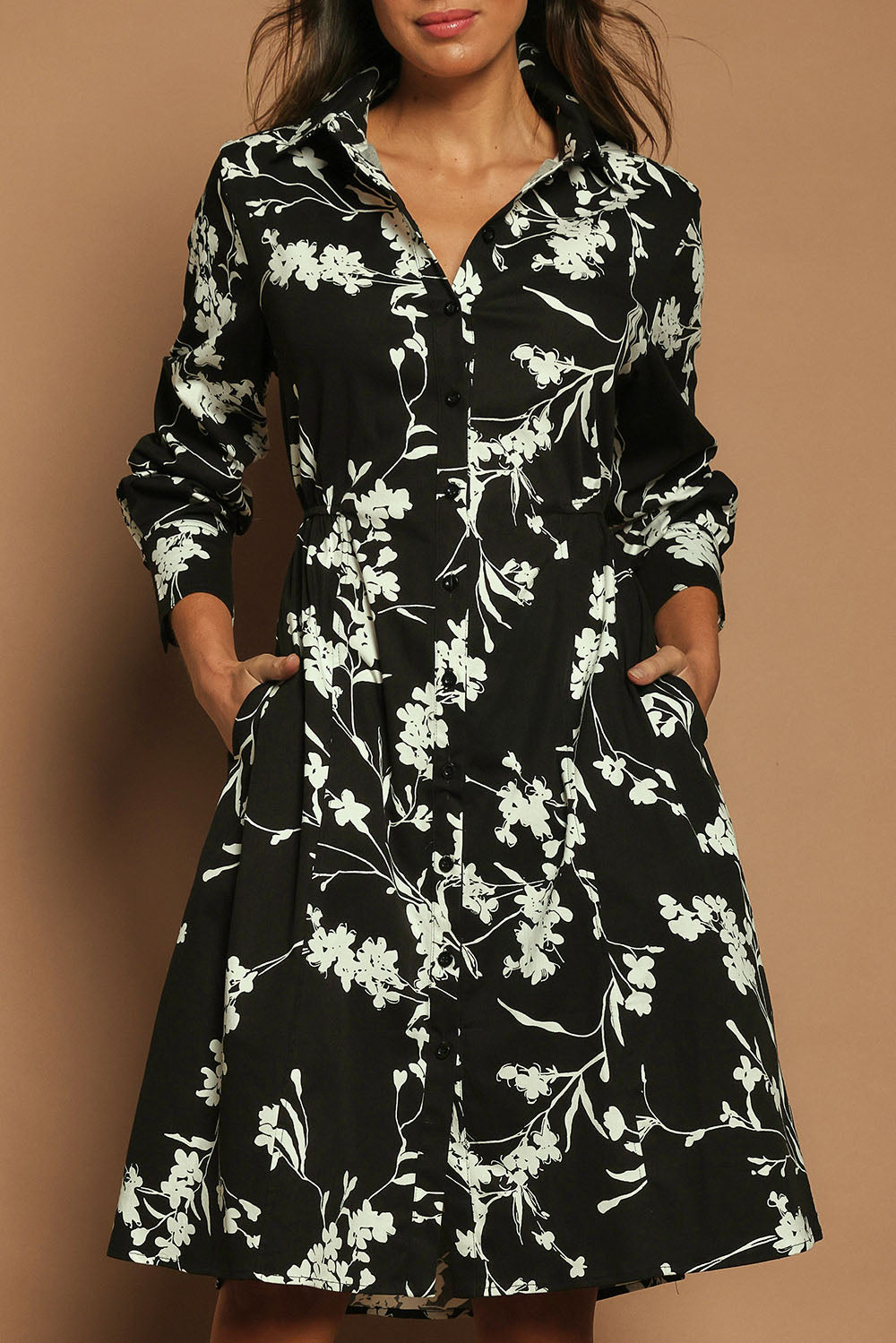Model Madeline wearing size 10 of The Printed Cotton Stretch Shirt Dress in colour Blackfleur (Black), from the front, cropped image