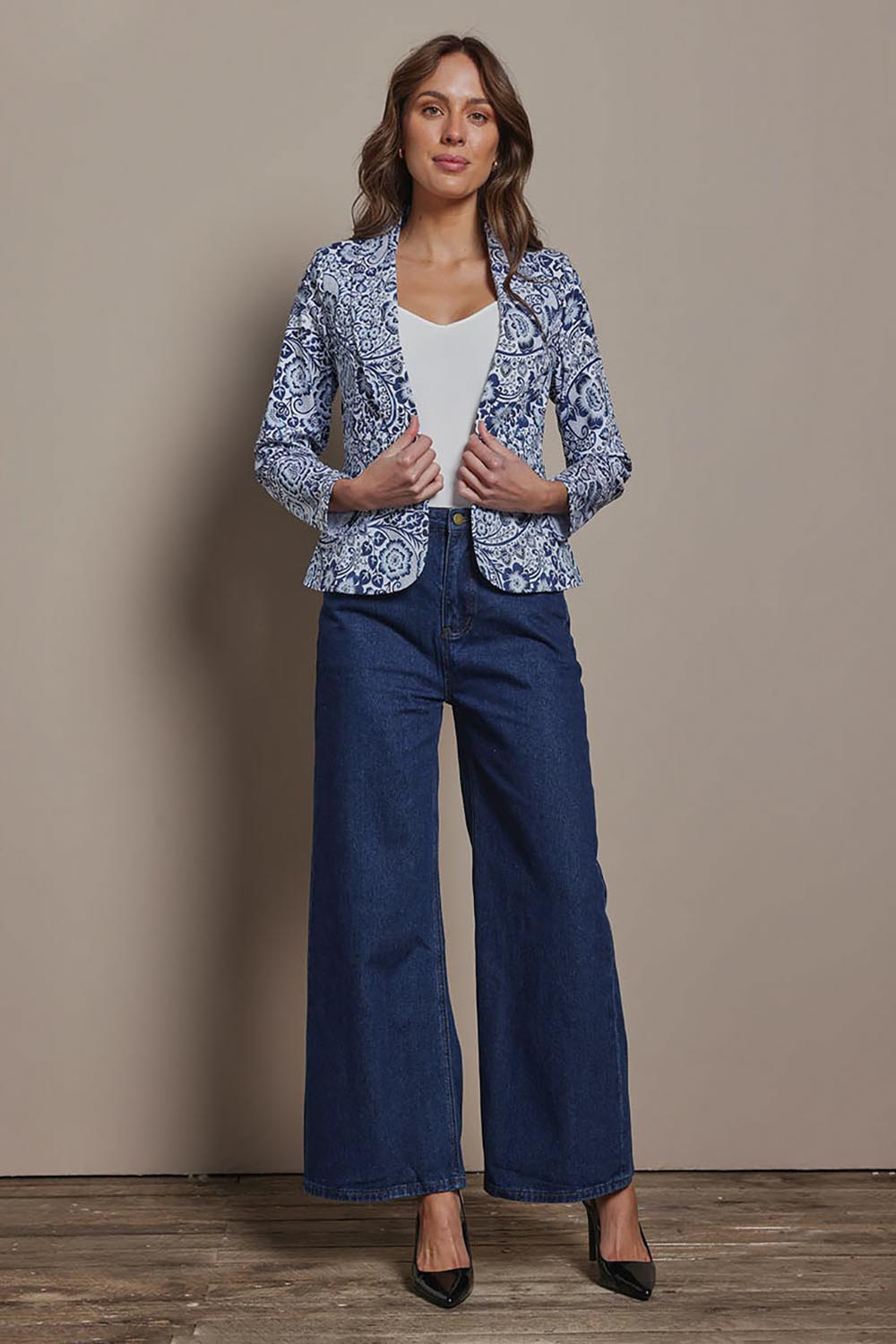 Model Madeline wearing size 10 of The Aspire Blazer in colour Peony (Blue), from the front, showing the whole outfit