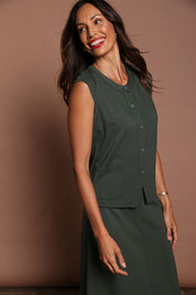 Model Amanda wearing size 10 of The Ponte Button Through Top in colour Forrest (Green), from the front, showing the whole outfit