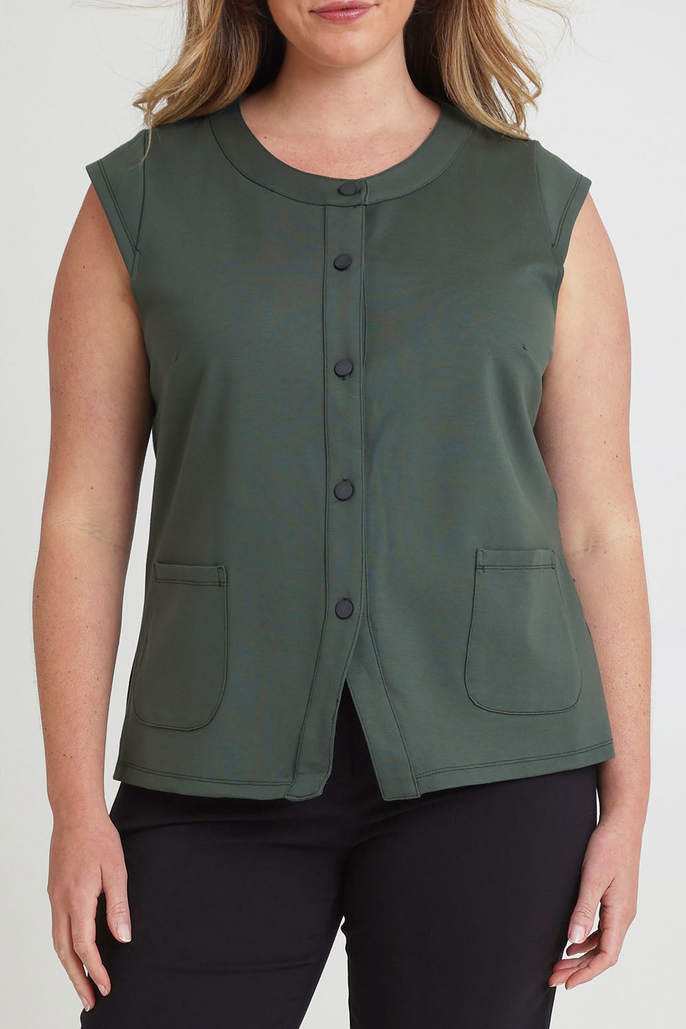 Model Chanel wearing size 16 of The Ponte Button Through Top in colour Forrest (Green), from the front, cropped image