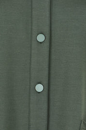 Product shot of The Ponte Button Through Top in colour Forrest (Green), detail