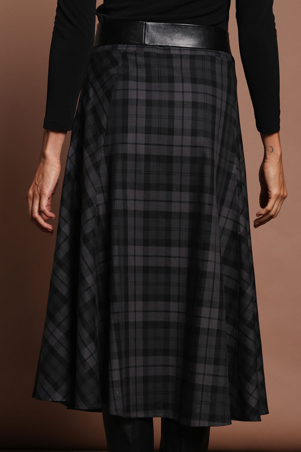 Model Amanda wearing size 10 of The Cotton Check Flare Skirt in colour Blackgrey (Black), from the back