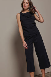 Model Madeline wearing size 10 of The Cotton Blend Pull On Culotte in colour Black (Black), from the front, showing the whole outfit
