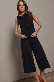 Model Madeline wearing size 10 of The Cotton Blend Pull On Culotte in colour Black (Black), from the front, showing the whole outfit