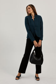 Model Amanda wearing size 10 of The Reverse Lapel Ponte Blazer in colour Lagoon (Green), from the front, showing the whole outfit
