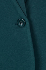 Product shot of The Reverse Lapel Ponte Blazer in colour Lagoon (Green), detail